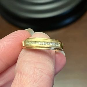 Men’s 10 karat yellow, gold and diamond accent ring